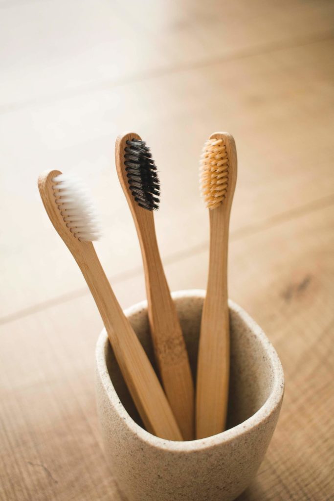 A bamboo toothbrush is a great essential to be zero waste in the bathroom. 