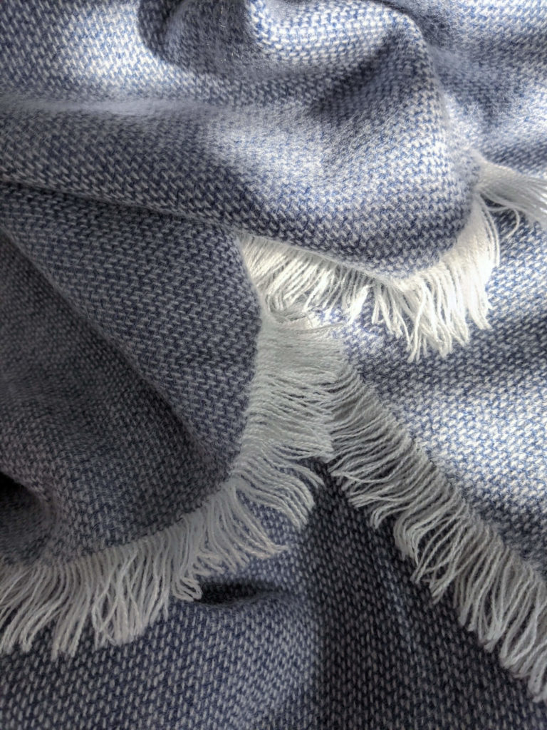 Cozy throw blankets are one of my favorite sustainable fall essentials.