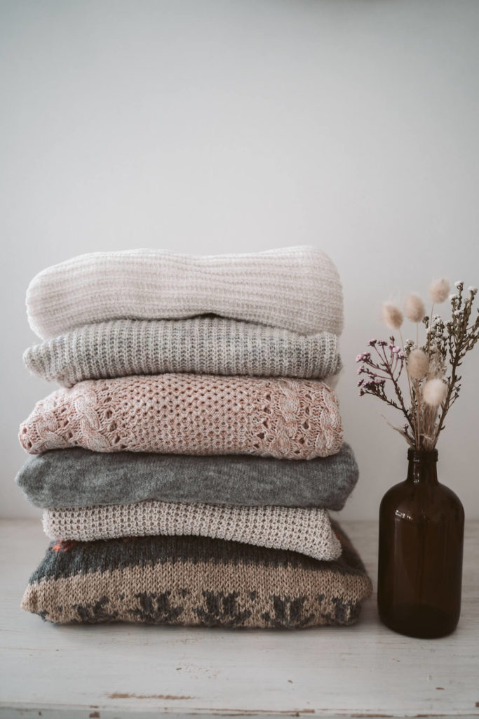 Cozy, ethically-made sweaters are some of the best sustainable winter essentials to have around. 